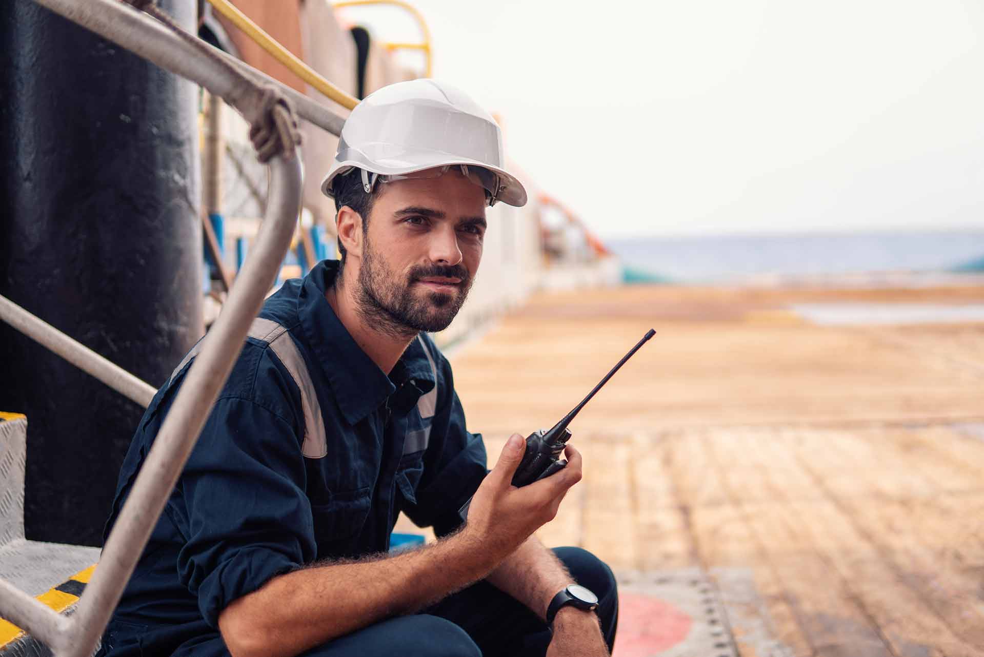 Man Using Radio On Ship | Radio Industries Australia