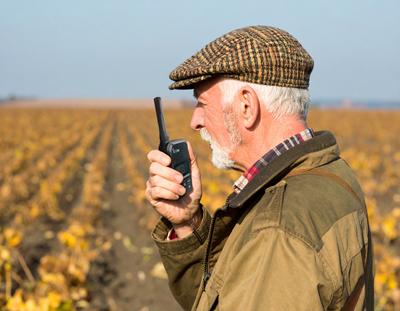 Farmer with Two way Radio